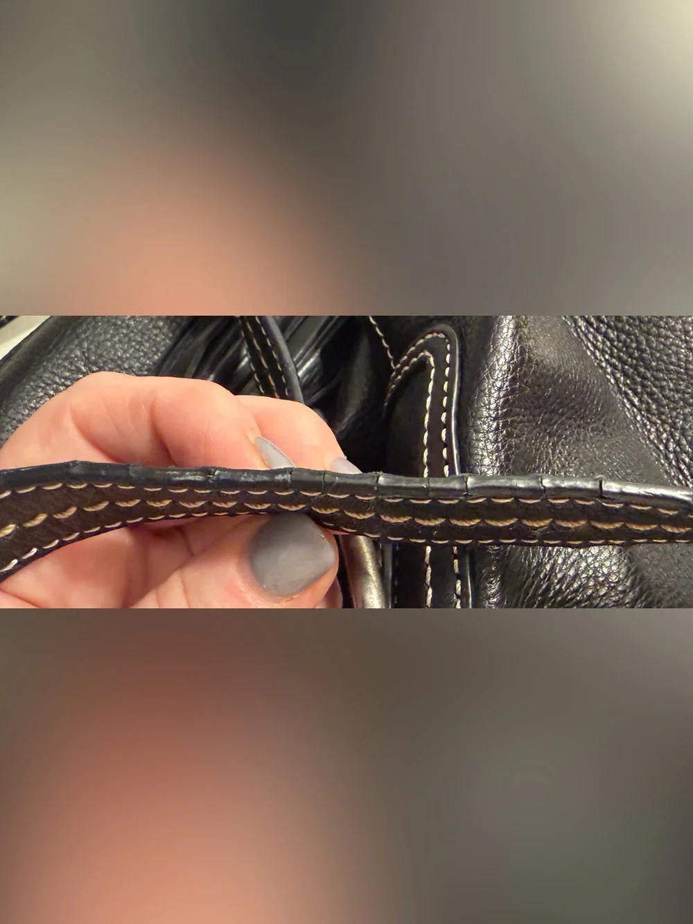 The Sak “PO Asbury” large pebbled black leather hobo/shoulder bag.